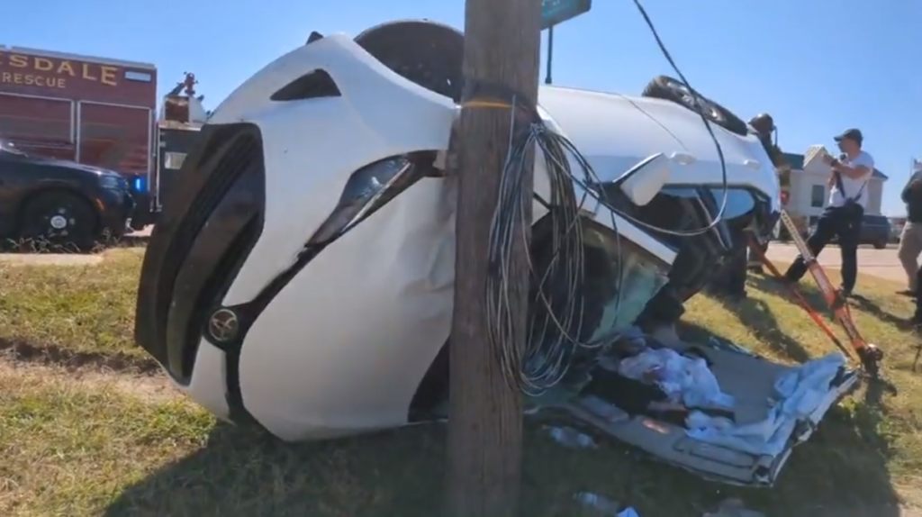 Toyota Corolla going southwest on State Street found upside down