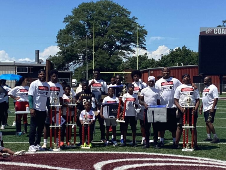 Rain Can’t Stop the Game: More Than 300 Attend 5th Annual Elgton Jenkins & JT Gray Football Camp